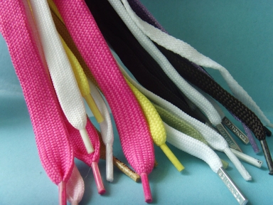 colourful flat tubular shoelace with metal and plastic tips